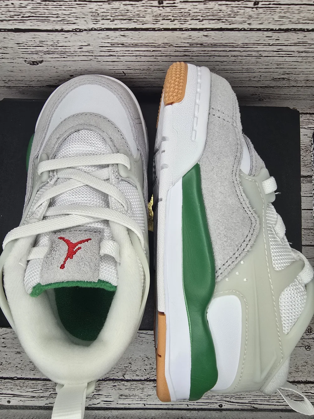 Jordan 4 RM Kids' White and Gray Athletic Sneakers with Green Accents